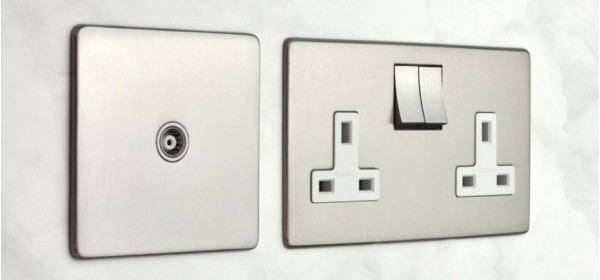The Studio Range of Screwless Switches and Sockets from Heritage Brass