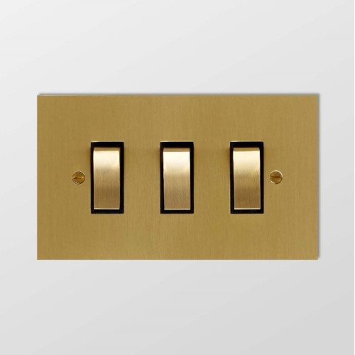 3 Gang 20A 2 Way Rocker Switch in Brushed Brass Plate and Rocker with Black Trim by Forbes and Lomax