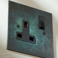 1 Gang 13A Switched Single Socket in Verdigris Plate with Black Rocker and Trim