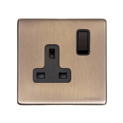 1 Gang 13A Switched Single Socket Screwless Vintage Antique Brass Plate with a Black Switch and Trim