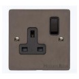 1 Gang 13A Switched Single Socket in Matt Bronze Flat Plate and Rocker Switch with Black Trim