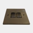 2 Gang 2 Way 10A Rocker Switch in Antique Brass Elite Flat Plate and Switch with Black Trim