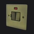1 Gang 13A Switched Fused Spur with Neon in Antique Brass Elite Flat Plate and Switch with Black Trim
