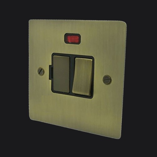 1 Gang 13A Switched Fused Spur with Neon in Antique Brass Elite Flat Plate and Switch with Black Trim