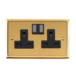 2 Gang 13A Switched Twin Socket Mayfair Dual Finish Satin Brass Raised Plate with Polished Brass Stepped Edge Black Switch and Trim
