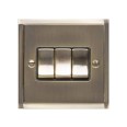 3 Gang 2 Way 10A Rocker Switch in Antique Brass and Black Trim Elite Stepped Flat Plate