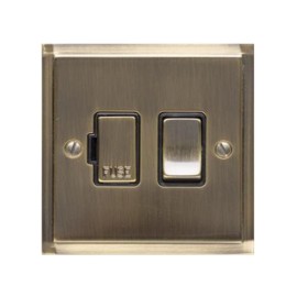 1 Gang 13A Switched Fused Spur in Antique Brass Elite Stepped Plate with Black Trim