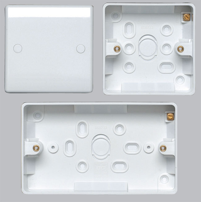 White plastic devices with a stylish modern look for the home and the office - the blanking plates and the back boxes for single/double wiring devices.