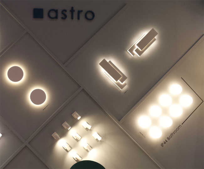 Astro Lighting - a lovely combination of the white plaster wall lights with concealed wall lighting